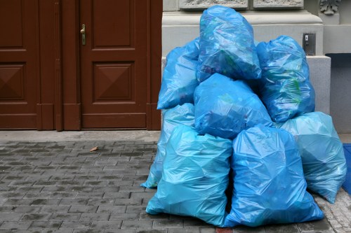 Efficient waste removal trucks in Raynes Park